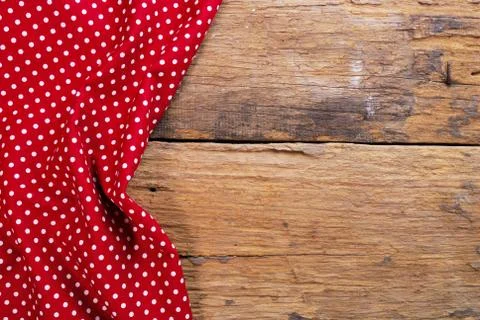 The background made from checkered napkin on old wooden table Stock Photos