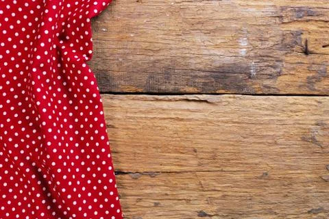 The background made from checkered napkin on old wooden table Stock Photos