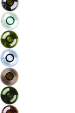 Background made from empty wine bottles, brown, blue, green and white Stock Photos