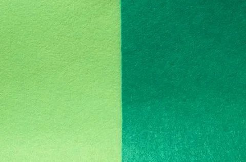 The background is made of felt in two shades of green Stock Photos