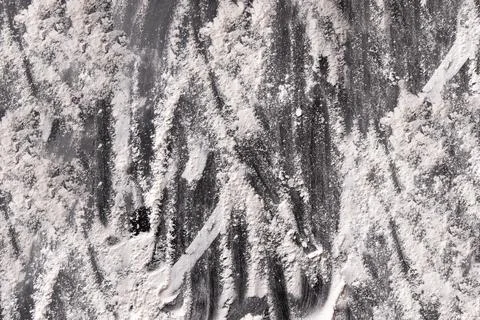 The background is made of flour. Black background with flour 库存照片