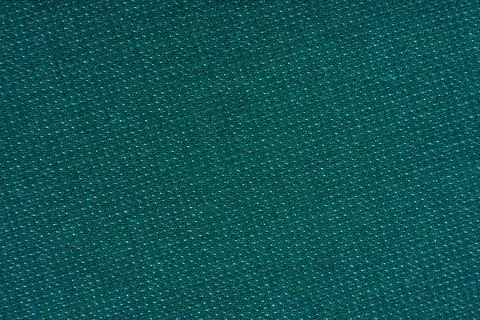 The background is made of green. blue material. Fabric for sewing clothes Stock Photos