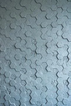 Background made of grey hexagonal gypsum tiles, textured, mosaic. Stock Photos