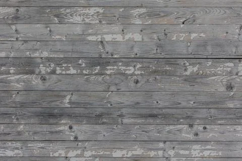 The background is made of old aged rough wooden boards. Stock Photos