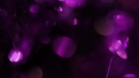 Background made of purple bokeh light effect on black Vídeo Stock 318943519