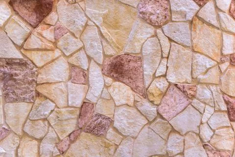 Background made of red stone wall Stock Photos