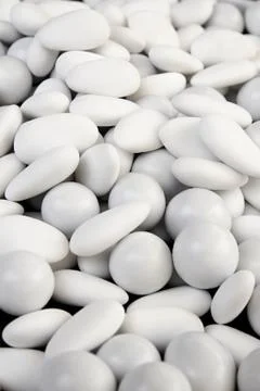 Background made of round white sugared almond Stock Photos