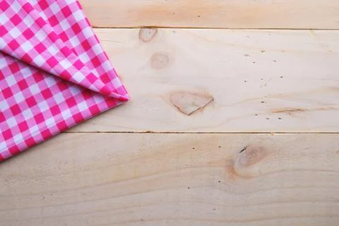 The background made from tablecloth on wooden table Stock Photos