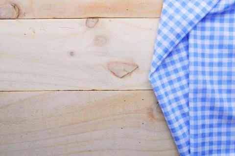 The background made from tablecloth on wooden table Stock Photos