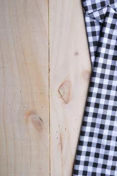 The background made from tablecloth on wooden table Stock Photos