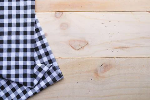 The background made from tablecloth on wooden table Stock Photos