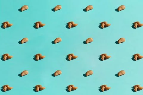 Background made from walnuts on the blue background Stock Photos