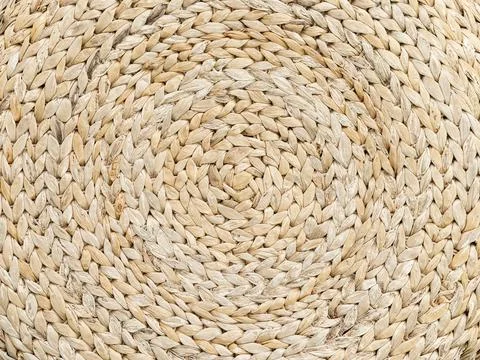 Background is made of woven straw. Circular pattern. Stock Photos