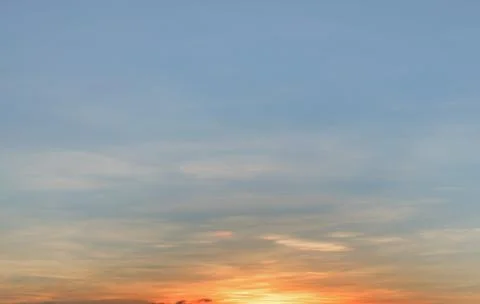 Background with magic of the sky and clouds at sunrise and sunset Stock Photos