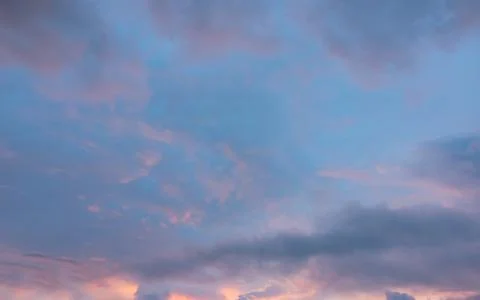 Background with magic of the sky and clouds at sunrise and sunset Stock Photos