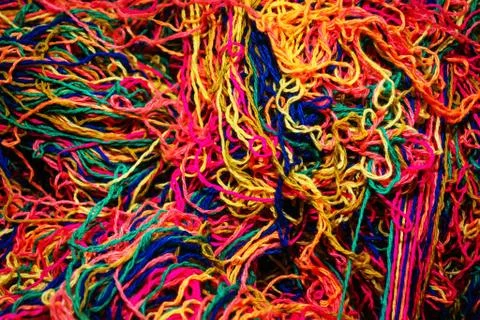Background of many colored woolen tangled threads Stock Photos