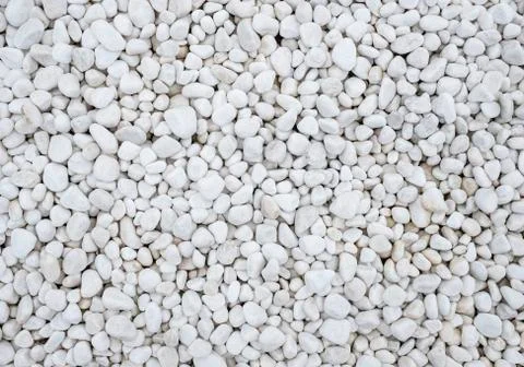 A background of many large and small white stones Stock Photos