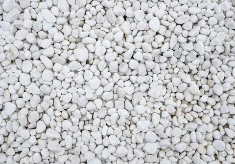 A background of many large and small white stones Stock Photos