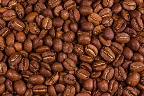 Background of many roasted coffee beans Stock Photos