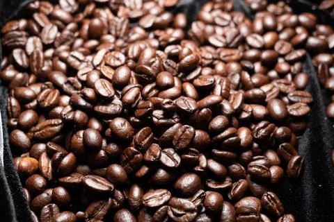 Background with many roasted coffee beans,Texture of roasted coffee beans Stock Photos