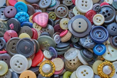 Background many scattered old buttons Stock Photos