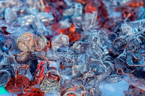 Background with many silver rings, silver rings collection. Stock Photos
