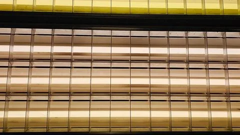 Background of mesh and long fluorescent lamps Stock Photos