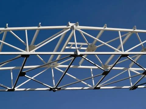 Background as metal structures with fire protection over clear deep blue sky  Stock Photos