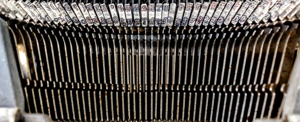 Background of metallic elements of retro typewriter Stock Photos