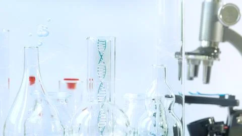 Background with microscope, atom, test tubes. Stock Photos