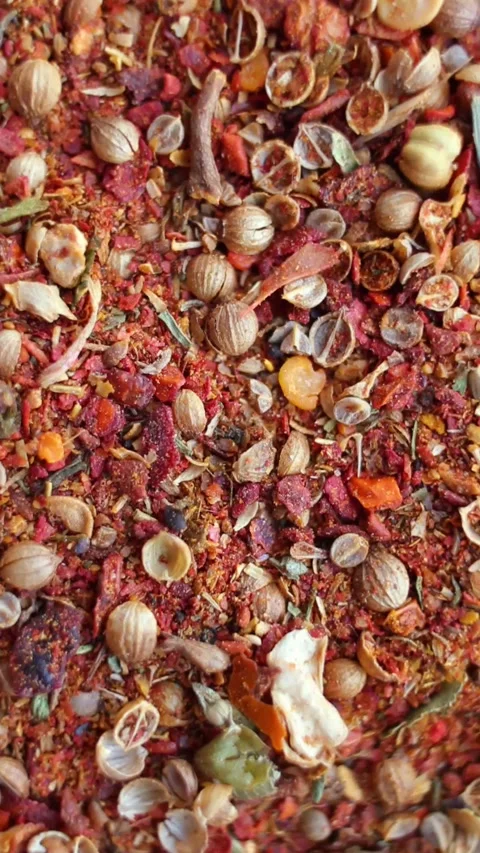 Background of mixed spices close up rotating, top view. Vertical video. Stock Footage 274880708