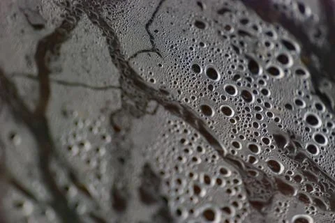 Background of moisture water drops macro from under the plastic material. Stock Photos
