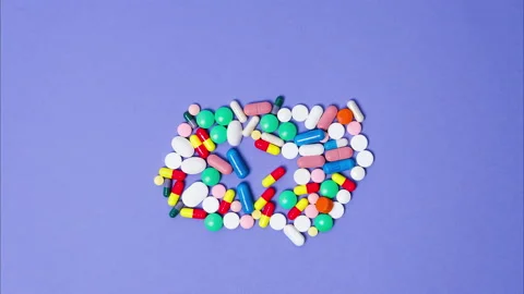 Background with moving pills. Stop motion 4K resolution medical video. Stock Footage 171089856