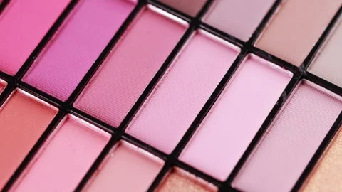 Background of multi-colored eye shadows for applying makeup on the eyelids Vidéo 254660677