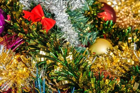 Background of multi-colored shining Christmas decorations close-up. Stock Photos