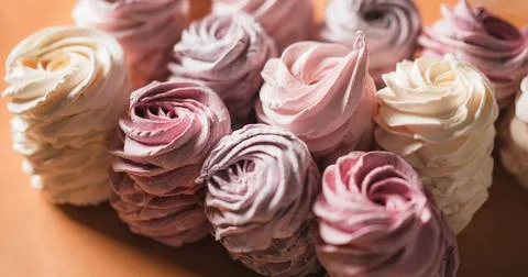 Background from multi-colored zephyr located in a row. Tea drinking concept.  Stock Photos