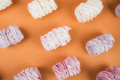 Background from multi-colored zephyr located in a row. Tea drinking concept.  Stock-Fotos