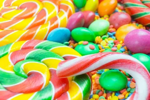 Background from multicolored assortment of delicious candy top view Stock Photos