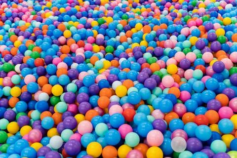 Background of multicolored balls. Children's play pool. Stock Photos