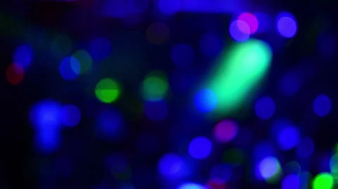 Background of multicolored blurred round light glare. Stock Footage