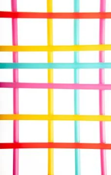 Background with multicolored crossed straws Stock Photos