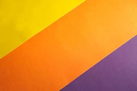 Background of multicolored paper parallel stripes of orange, yellow and pur.. 写真素材