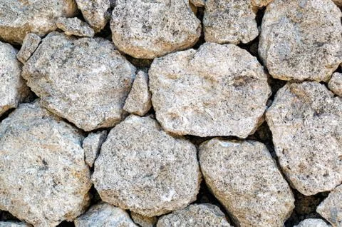 Background of natural large light stones. Stock Photos