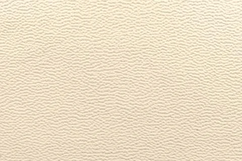 The background of natural leather is light brown with a yellowish tint. Leath Foto stock