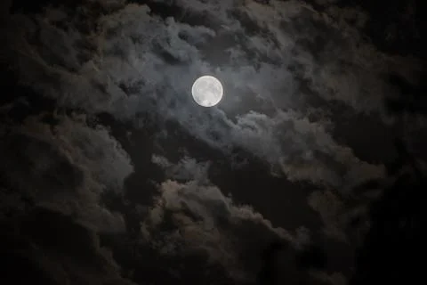 Background with night cloudy sky and full moon. Halloween Spooky night. Stock Photos