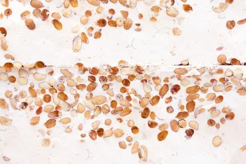 Background of nougat with nuts at the fair Stock Photos
