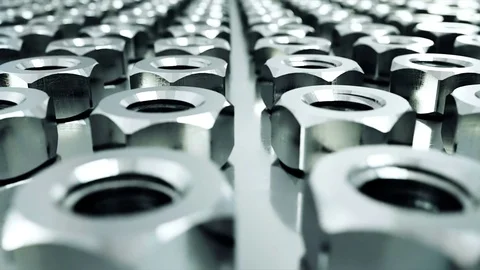 Background of nuts, screws. Industrial concept. Factory equipment. Steel.  Stock Footage 73838585
