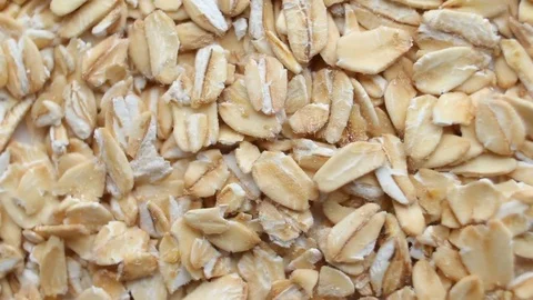 Background of oats grains rotating close up Stock Footage 83474990