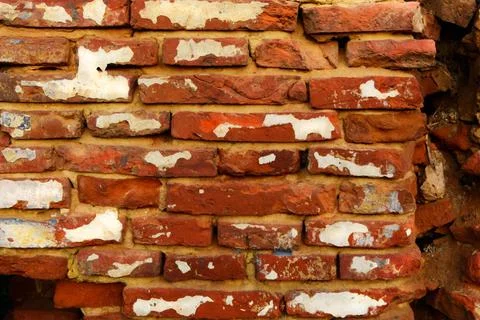 Background of an old brick red wall. Stock Photos