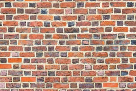Background of old brick wall pattern texture. Stock Photos
